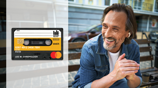 A smiling man sitting on a bench. Image of the KEXP Debit Card.
