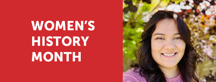 White text on red background says "Women's History Month," next to an image of a woman's smiling face. She is outside with green leaves behind her.