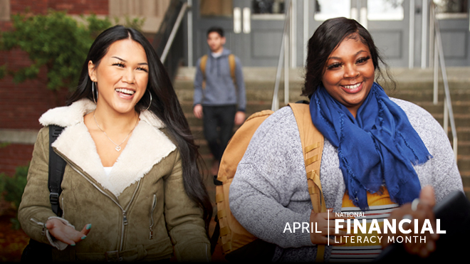 Two smiling college students walk away from a building on campus together. White text in the lower right of the image reads "April: National Financial Literacy Month."