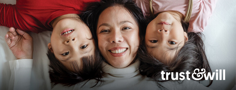 Smiling mother, son and daughter, Trust & Will logo