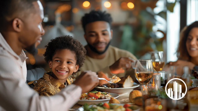 A family eating at a restaurant. Passport logo.