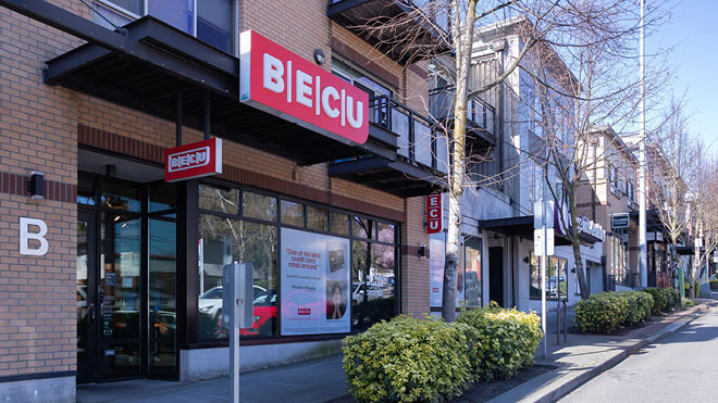 BECU Ravenna location, a building with a sign on the front