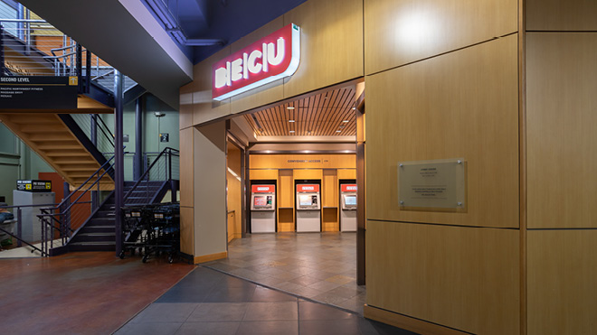 BECU Seattle-Broadway location, a building with a sign and ATMs